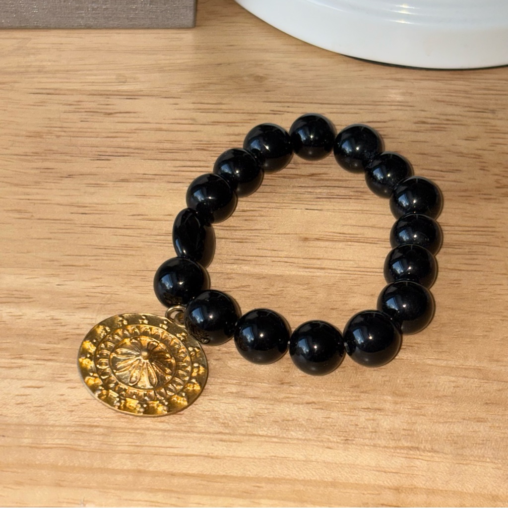 Black Beaded Bracelet With Gold Pendant